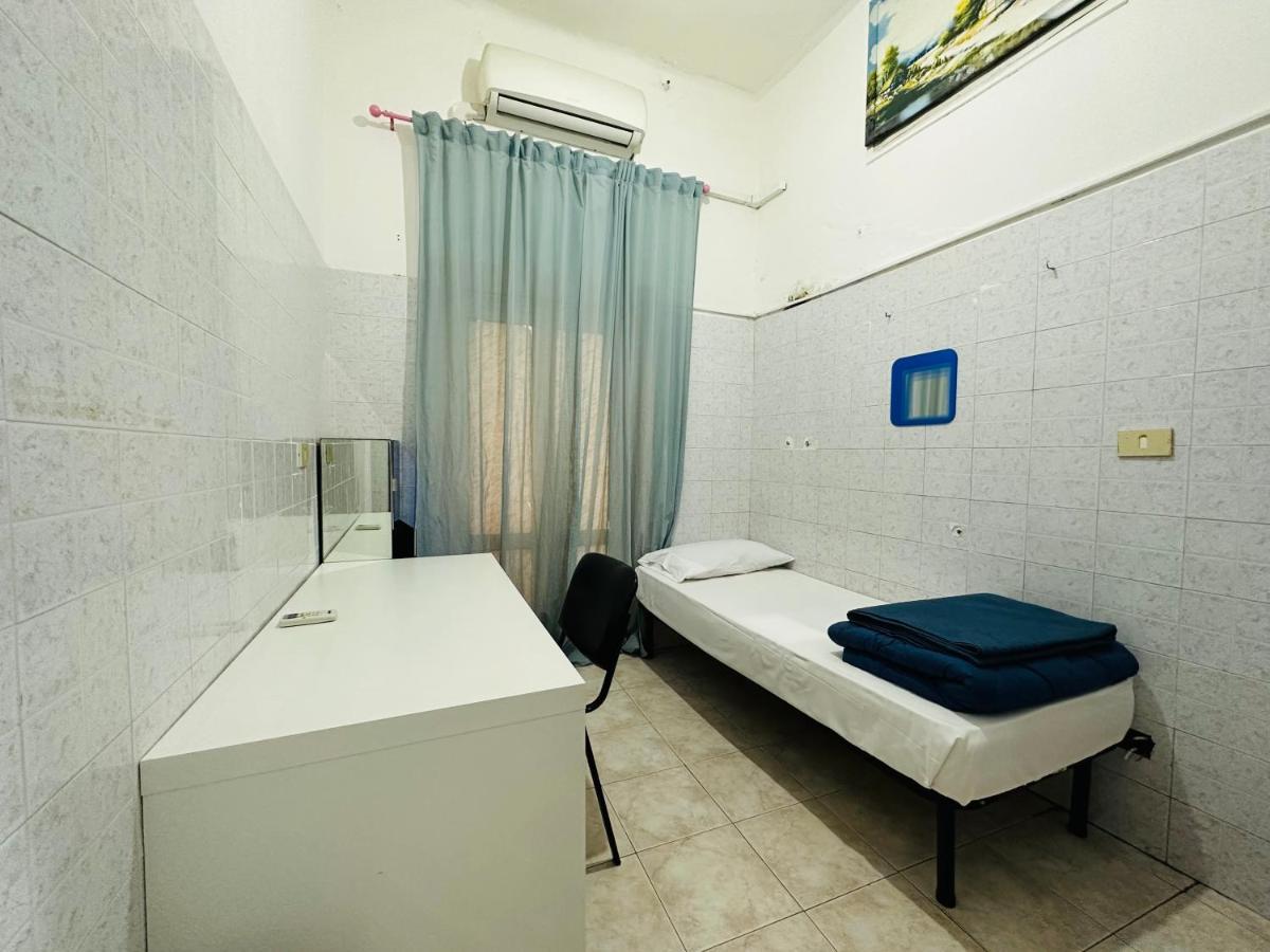 Habitación Individual con baño compartido